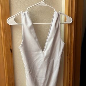 Deep V cut, sexy white bodysuit